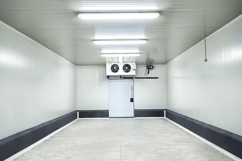 Commercial cold room with black bottom rim with 3 white lights